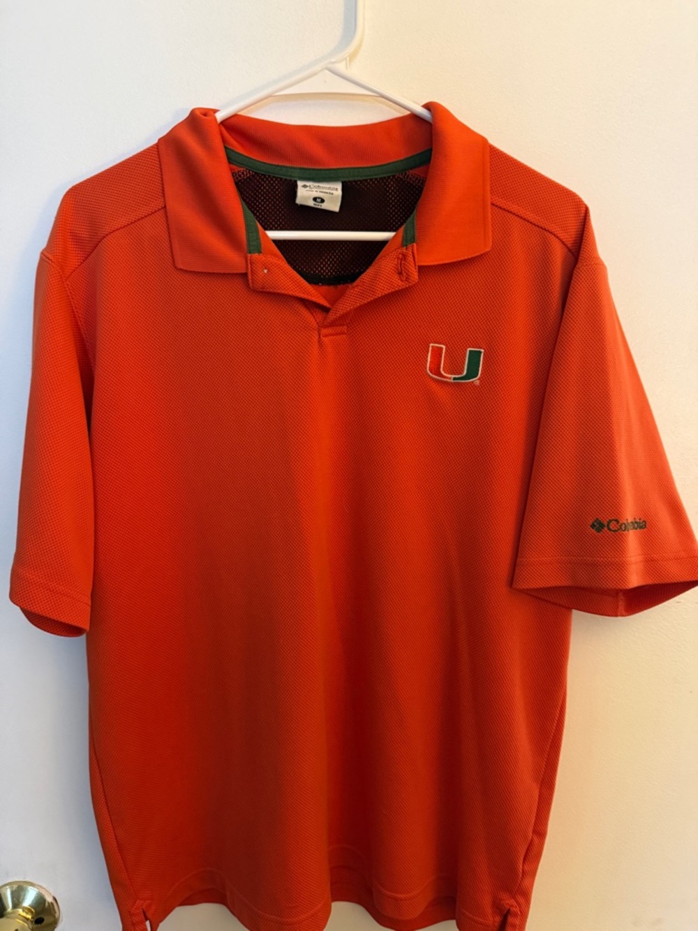 Columbia Men's Orange Polo with Green Accents and Miami U Logo